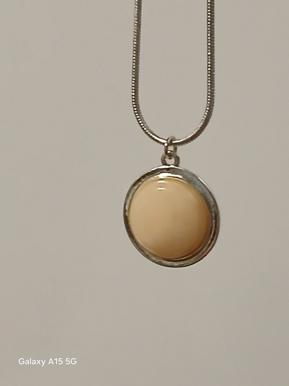 Cream Round Pendant Necklace with Silver-Tone Frame
